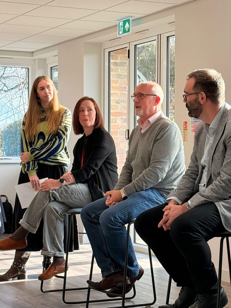 Business leaders discussing social impact and community contribution